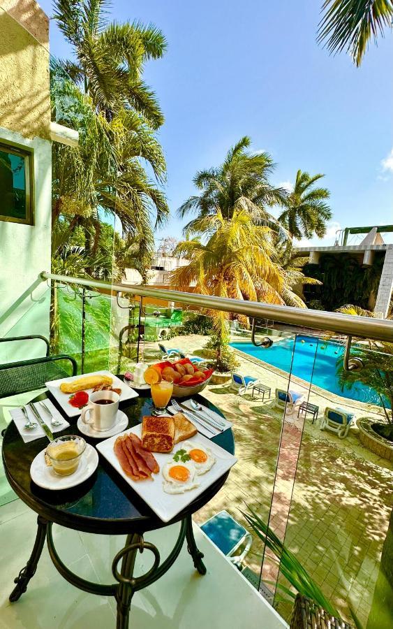 Hotel Plaza Caribe Канкун Екстериор снимка