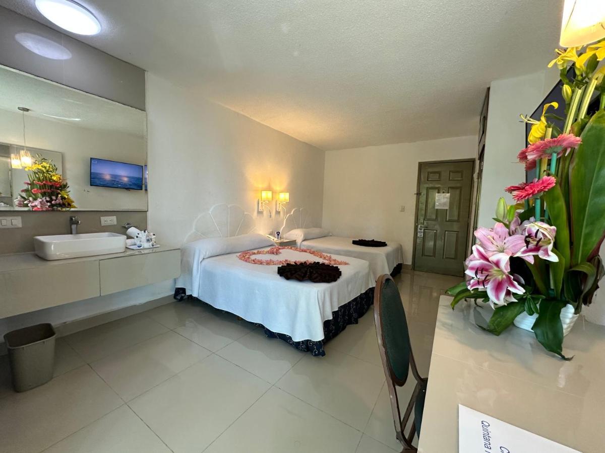 Hotel Plaza Caribe Канкун Екстериор снимка
