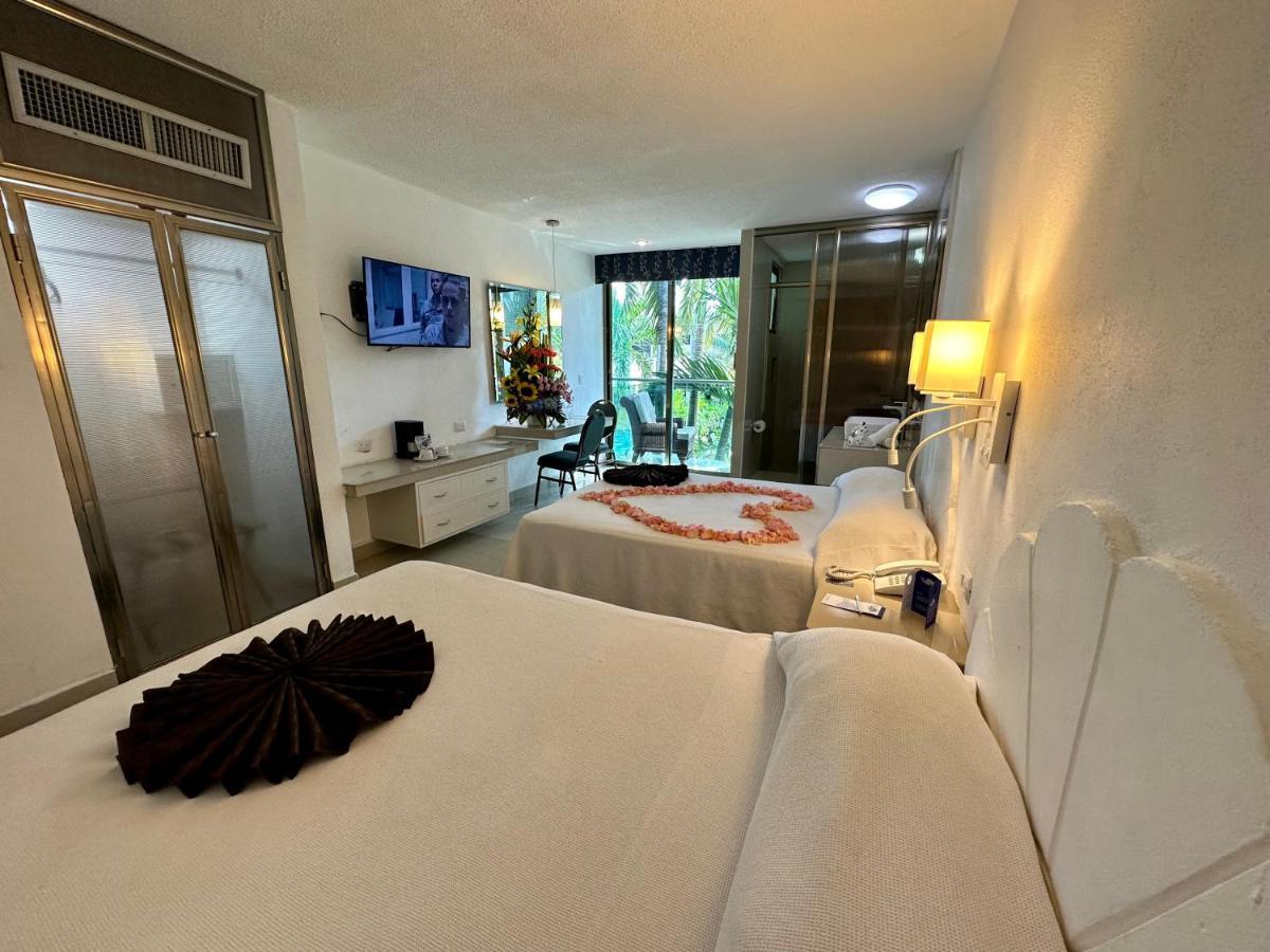 Hotel Plaza Caribe Канкун Екстериор снимка
